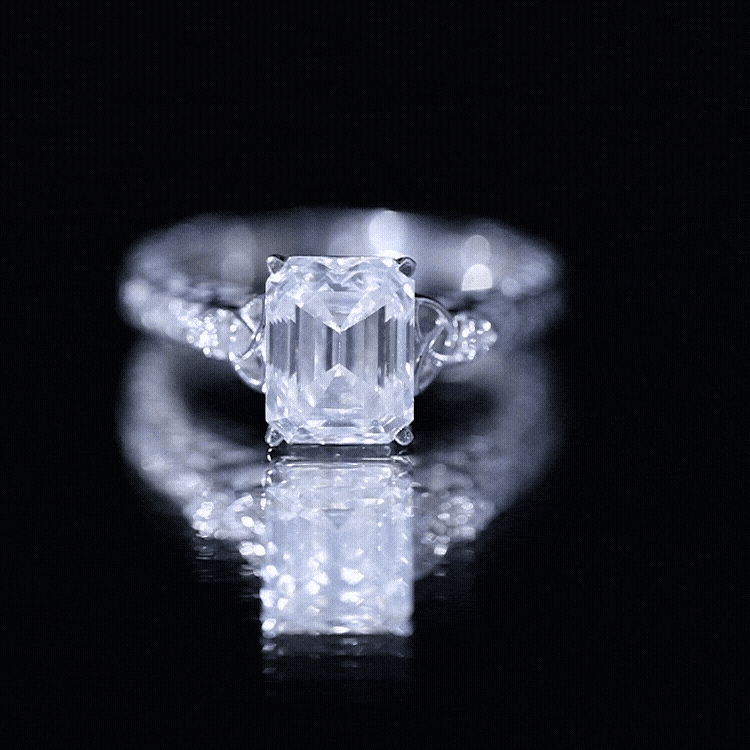 7X9 mm Emerald Cut Moissanite Solitaire Celtic Ring with Engraved Shank