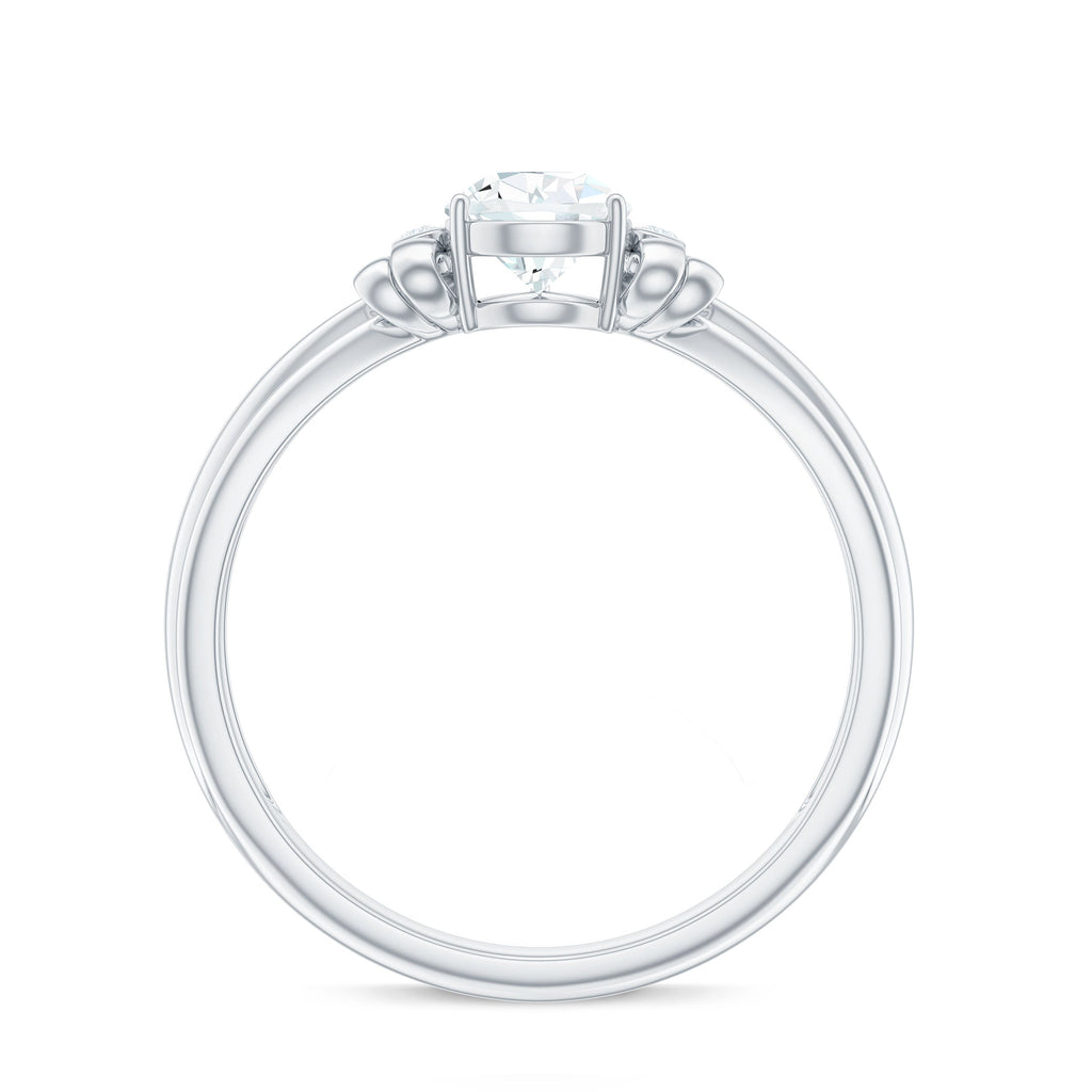 5X7mm Pear Shape Moissanite Bow Engagement Ring